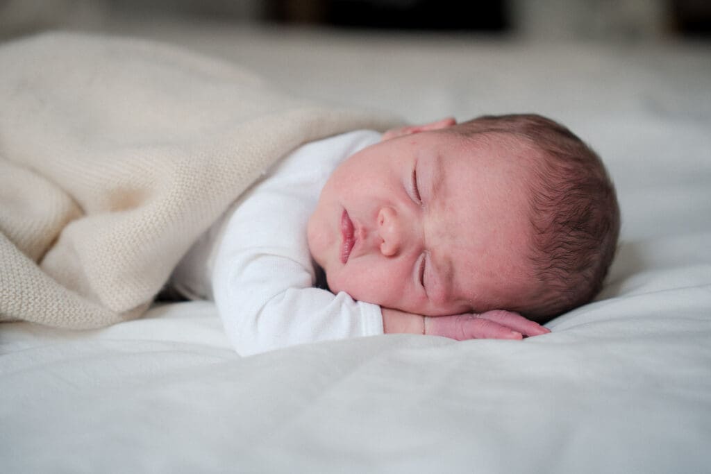Close up of sleeping newborn baby within first two weeks of life