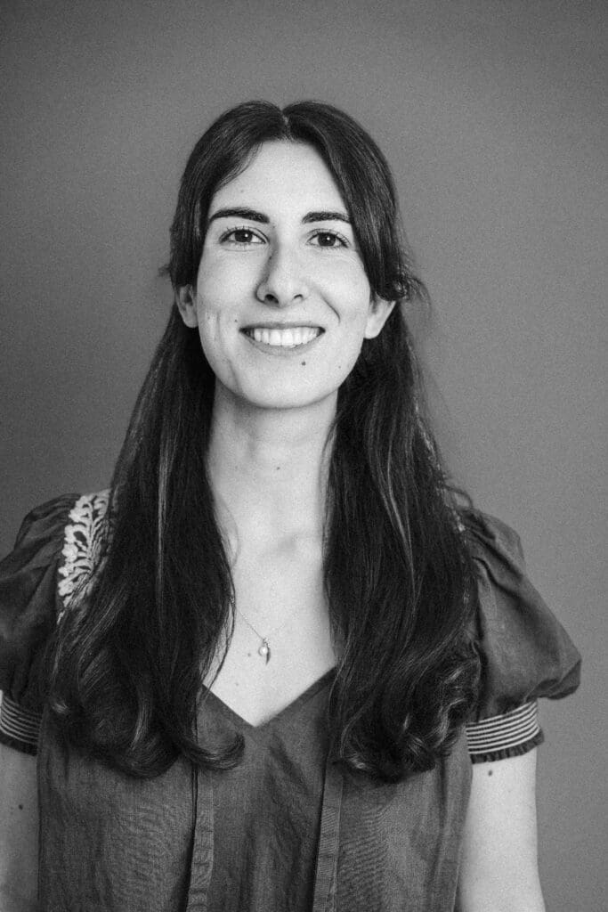 Black and white portrait of Sofia registered midwife at Pippagina English prenatal and postnatal classes Munich